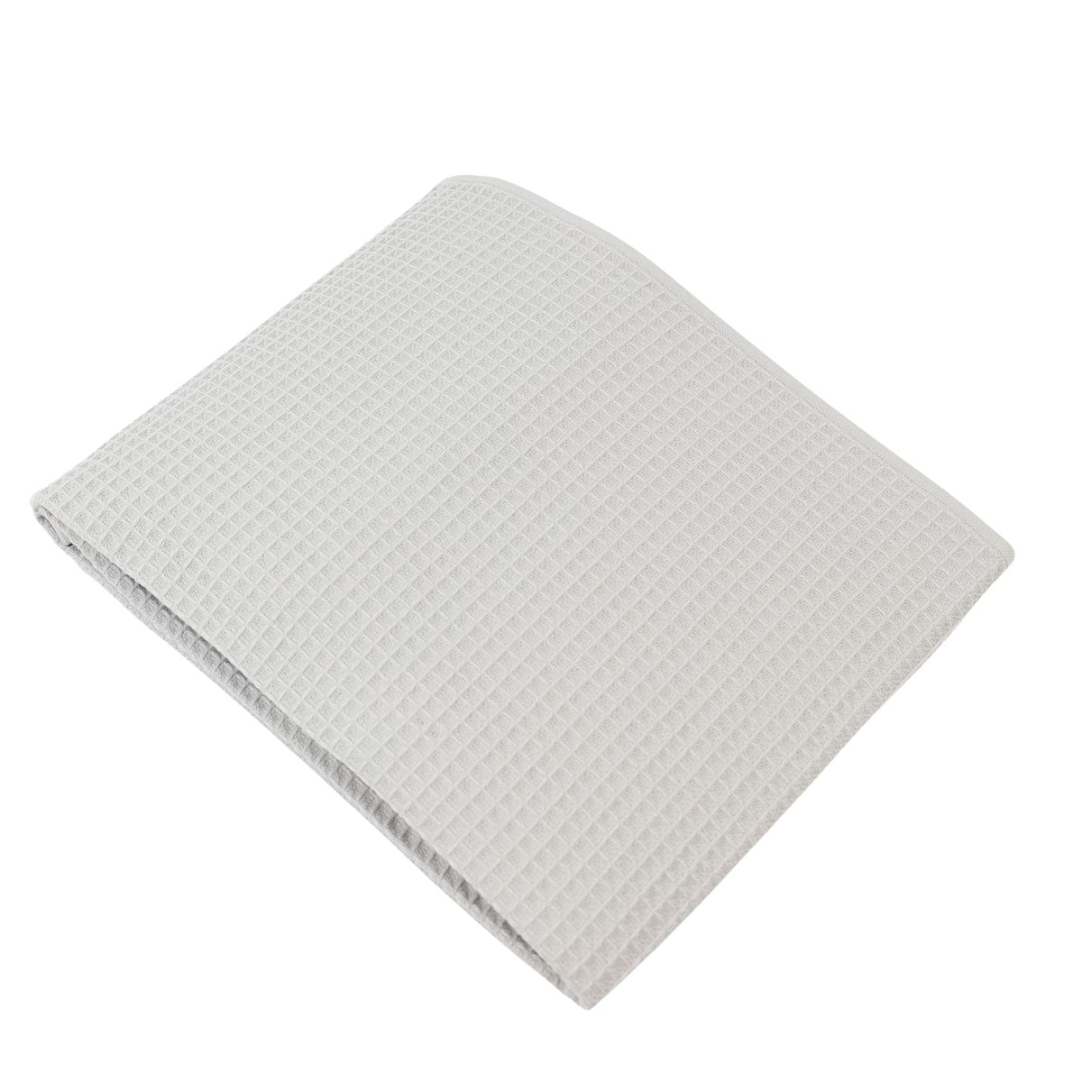 Serviette grise en nid d'abeille pliée en 4 sur fonc blanc